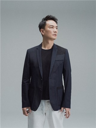 (图注:音乐剧《流光时代》音乐总监 李泉)